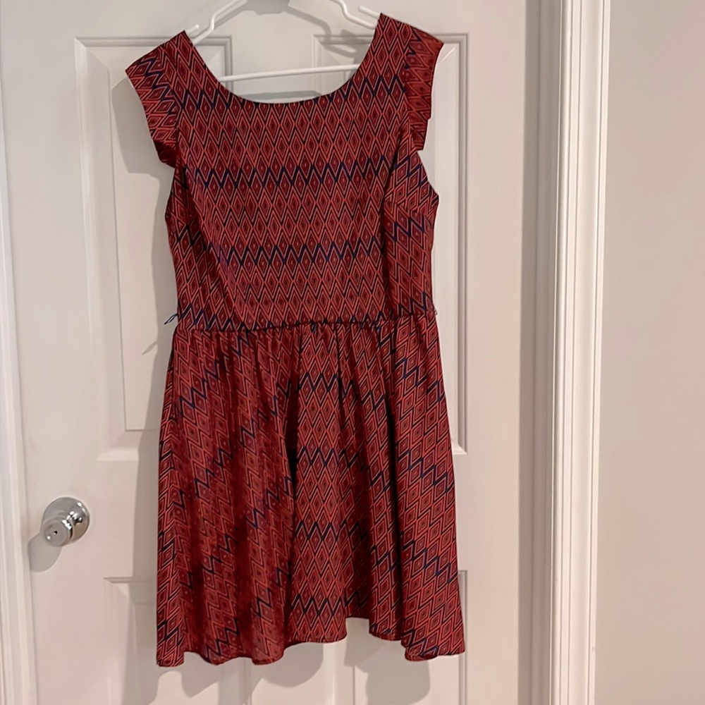 Great dress in red and blue print. Looks fab with denim jacket and booties.
